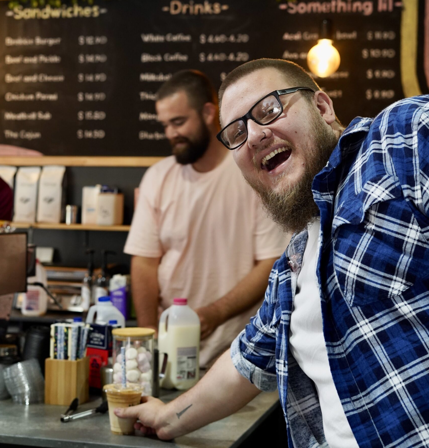 man getting coffee at church cafe