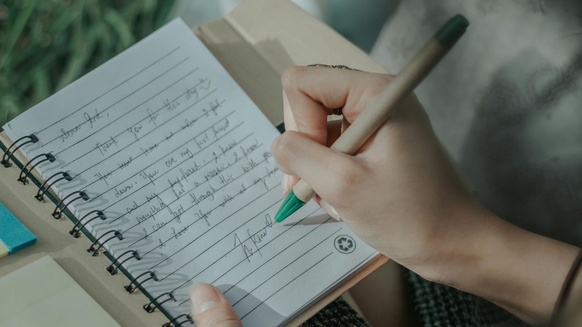 woman journaling about god