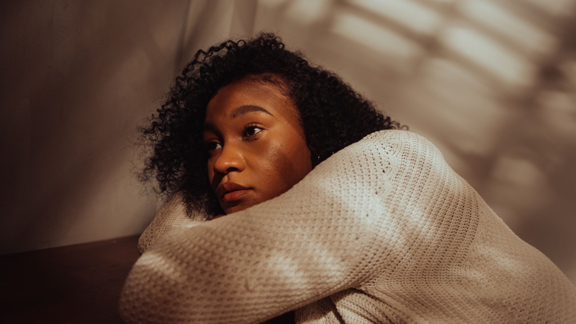 woman looking withdrawn